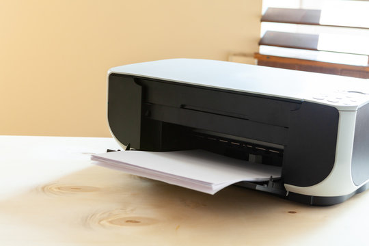 Close up of an office table with printer on it