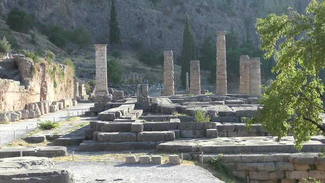 Apollo Temple in Delphi archaeological site at the Mount Parnassus. Delphi is famous by the oracle at the sanctuary dedicated to Apollo. UNESCO World heritage. Greece