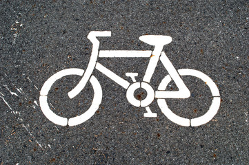white bicycle sign on alphart road