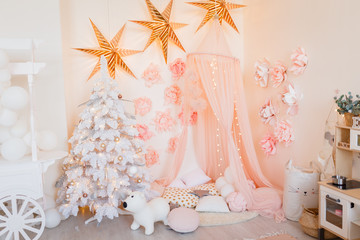Pink Christmas background with new year trees and other holiday decor, new year background