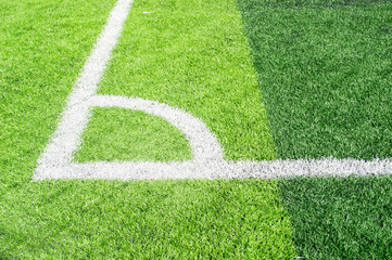 Obraz premium white line the corner Artificial turf on green grass soccer pitch ,football field