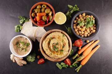 hummus, dipping sauce and vegetable, bread pita- lebanese food