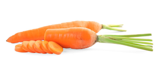 Whole and sliced ripe carrots isolated on white