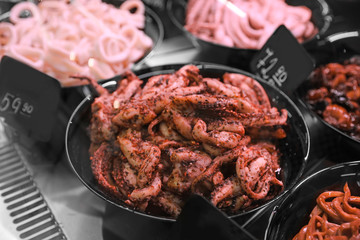 Different seafood on display, closeup. Wholesale market