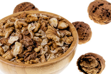 Background of delicious walnuts isolated on white background