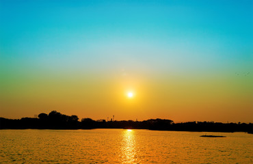 sunset with blue sky silhouette background