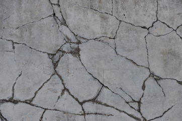 old gray cracked concrete wall
