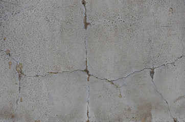 old gray cracked concrete wall