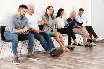 People waiting for job interview in office