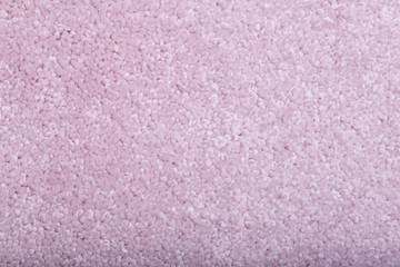 Carpet covering background. Pattern and texture of light pastel color carpet. Copy space.