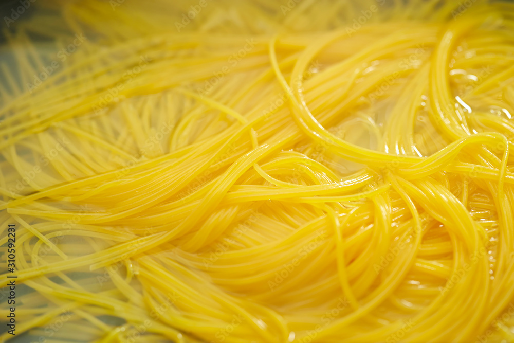 Poster Boiling spaghetti, cooking pasta noodle 