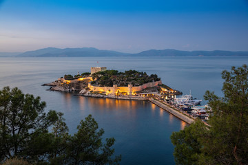 Kusadasi, Turkey. The road goes to Pigeon Island in Kusadasi. Kusadasi is a popular tourist destination in Turkey.