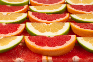 Pomelo and grapefruit slices background.