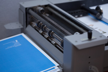 Production and gluing of books.