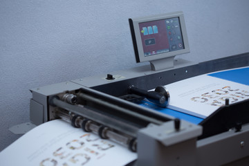 Production and gluing of books.