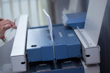 Production and gluing of books.