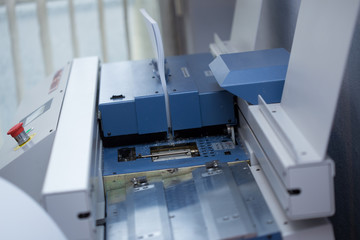 Production and gluing of books.