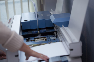 Production and gluing of books.