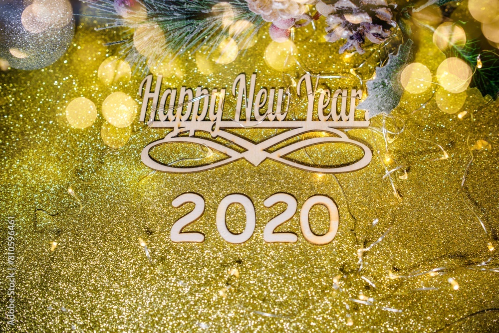 Sticker happy new year 2020 on gold shiny background