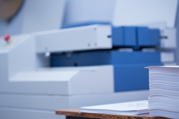 Production and gluing of books.