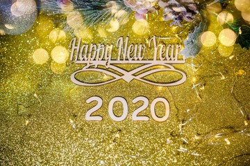 Happy new year 2020 on gold shiny background