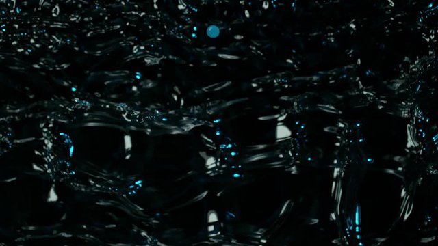 Water splashing on black background, super slow motion. Filmed on high speed cinema camera, 1000 fps.