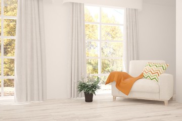 White stylish minimalist room with armchair and autumn landscape in window. Scandinavian interior design. 3D illustration