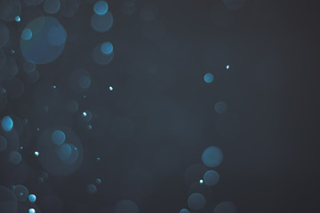 Abstract bokeh lights with light Blue background, beautiful bokeh from water droplets