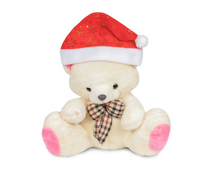 Teddy bear with a red Christmas hat on a white background.