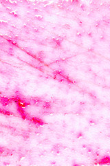 Obraz premium Pomegranate juice on a plastic board as an abstract background
