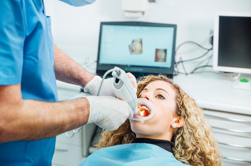Dentist using innovative 3d ultrasound for dental check