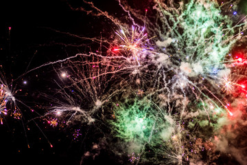 Spectacular fireworks in the dark sky. Celebration backgoround. New Year concept
