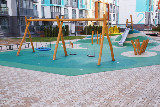 Public playground for kids in the local area among apartment buildings