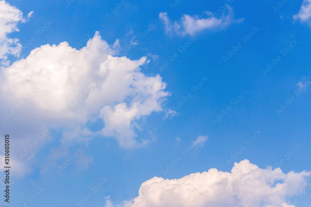 Wall mural blue sky with white clouds