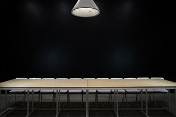 empty table and chairs on black background the last supper