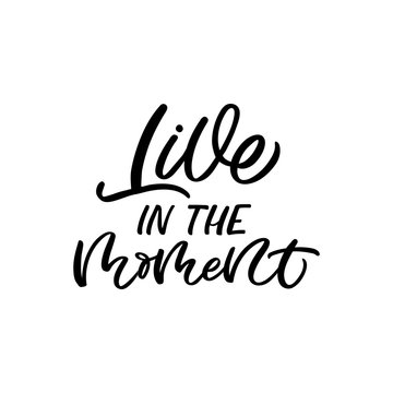 Hand drawn lettering quote. The inscription: Live in the moment. Perfect design for greeting cards, posters, T-shirts, banners, print invitations.