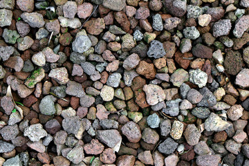 Close up photo for background with various colors of water absorbing pebbles covering the garden