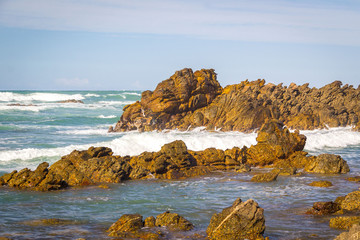 Cape Agulhas (also known as Cape of the Needles) - the southern-most tip of Africa, rocky coastline where Atlantic and Indian Oceans meet