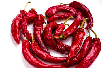 Few red hot chili peppers isolated on a white background. Valentine's day. Love. Passion.