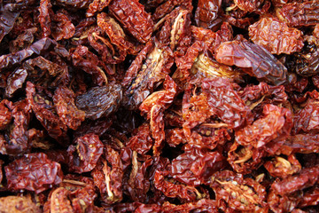 Dried tomatoes. Dry veggie or fruit. Tomato background.