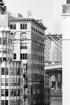 Fototapeta Black and white glimpse of the Manhattan Bridge as seen through Brooklyn's Main Street from the Brooklyn Bridge. Taken in New York City on September the 28th, 2019
