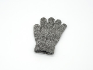 Gray children's gloves. For boys and girls. Left and right on a white background.  Selective focus