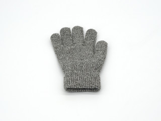 Gray children's gloves. For boys and girls. Left and right on a white background.  Selective focus