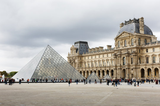 The Louvre Museum and Louvre Pyramid in Paris, France	