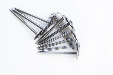 Steel nails for zinc roof isolated on white back ground.
