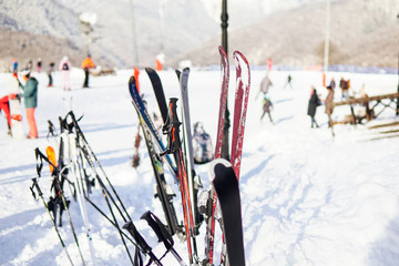 skis and Snowboards on the background of the ski resort vacation