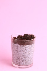 glass of chia pudding with blackberry flavor