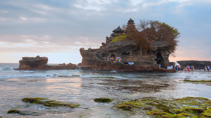 Naklejka premium Tanah Lot Temple at sunset - Most important hindu temple of Indonesia