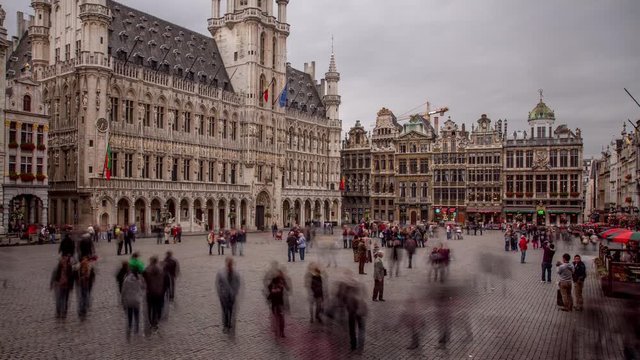Large city square in Brussels Belgium. Surrounded by historic buildings dating back to the 14th century.