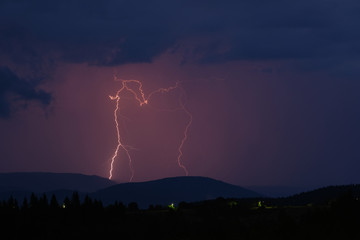 Thunderstorm with lightning on the mountain.
